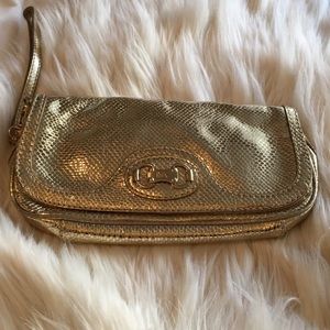 Michael Kors gold metallic wristlet